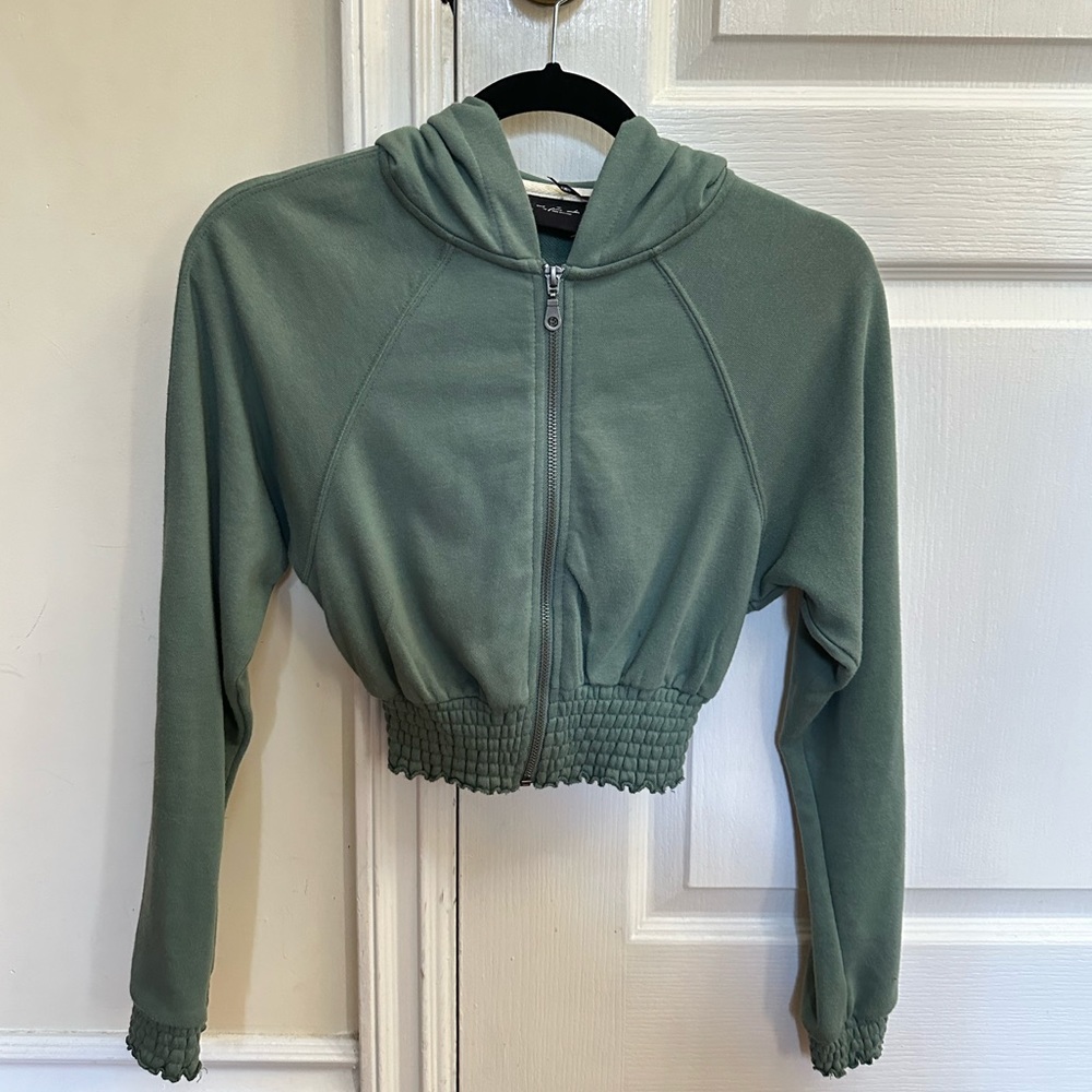 Urban Outfitters out from under teal zip up cropped hoodie